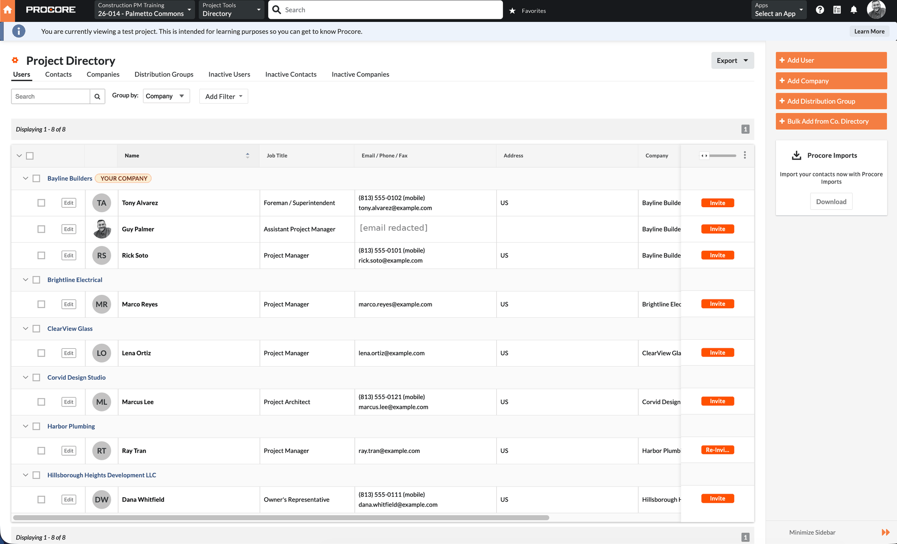 Procore project directory, Users tab, grouped by company, showing each person's job title and contact details.